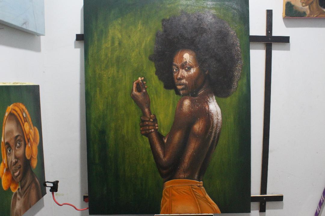 Oil portrait by Arinze Stephen Ekwuide on the studio wall